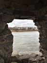 Big hole in stone wall. Stone casstle in Pskov city