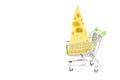 Big holes cheese wedge in a miniature shopping cart isolated on white. Royalty Free Stock Photo