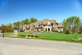 Big House suburb Single Family . Brick house with nice landscape and large green lawn Royalty Free Stock Photo