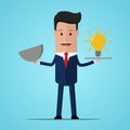 Big idea concept with man and lightbulb. Symbol of having an idea with businessman. Businessman holding a plate with a light bulb Royalty Free Stock Photo