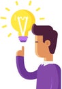 Big idea concept man and lightbulb. Symbol of having an idea with businessman pointing at light bulb Royalty Free Stock Photo