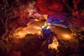 Big Illuminated crystal by candle light in cave. Mlynky Cave, Uk Royalty Free Stock Photo