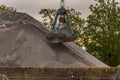 excavator collects graphite sand
