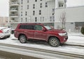 Big elegant Toyota Landcruiser 8V parked in snow Royalty Free Stock Photo