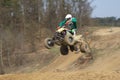 Big jump with quad motorbike. All trademarks are removed.