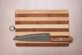 Big knife and breadboard on table Royalty Free Stock Photo