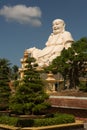 Big laughing sitting outdoor Buddha in Vinh Trang Pagoda in South Vietnam