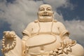 Big laughing sitting outdoor Buddha in Vinh Trang Pagoda in South Vietnam