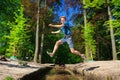 Big leap over the river of life Royalty Free Stock Photo