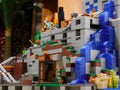 big lego constructor in the style of minecraft, adventure on mountain with waterfall