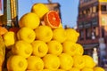 Big Lemons at market in Marrakesh, Morocco. Yellow tropical fruits in Africa. The background is blur. It is a booth to prepare