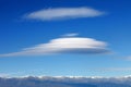 Big lenticularis cloud and snowed mountain Royalty Free Stock Photo