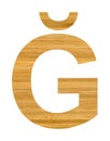 Big letter G or ÃÅ¾ used in Turkish alphabet, letter G or ÃÅ¾ cut from wooden bamboo Royalty Free Stock Photo