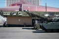 Big Leyland Motors Chieftain MK 10 tank parked in front of an American gun shop Royalty Free Stock Photo