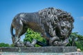 Big lion statue with snake