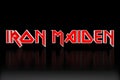 Big logo of the famous heavy metal group Iron maiden, on black background Royalty Free Stock Photo