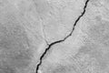 Big long curve ascending crack on old plastering wall. Copy space. Black and white photo. Royalty Free Stock Photo