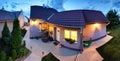 Big luxury house at dusk, night, panorama Royalty Free Stock Photo