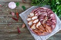 Big meat set. Homemade smoked pork-beef sausage, salted bacon, basturma chopped slices Royalty Free Stock Photo