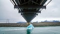 A big melting ice block floating towards the ocean in Jokulsarlon glacier lagoon, Iceland Royalty Free Stock Photo