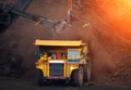 Big mining truck unload coal in coal mine Royalty Free Stock Photo