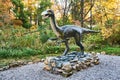Big model of prehistoric dinosaur Ornithomim in nature