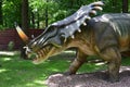 Big model of prehistoric dinosaur styracosaurus in nature. Realistic scenery