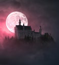 The big moon behind the castle Royalty Free Stock Photo