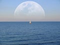 Big Moon in the sky above the sea and a small sailing ship. Photo collage