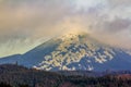 Big mountain with foggy clouds over the summit Royalty Free Stock Photo