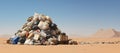 A big mountain of garbage, trash and plastic waste abandoned in a desert Royalty Free Stock Photo