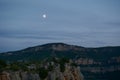 The big mountain with the moon one summer day Royalty Free Stock Photo