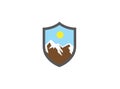 Big mountains with sun up and snow in a shield for logo design