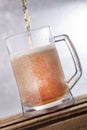 Big mug Beer Over flow Royalty Free Stock Photo