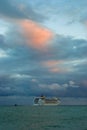 Big oceanic ship sailing off from Yalta port at fall evening Royalty Free Stock Photo