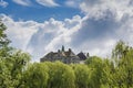 Big old ancient castle on the hill in the village not far from Lviv city Royalty Free Stock Photo