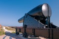 Big old black cannon on a steel carriage with wheels. Old military fort in Florida on a summer day. Royalty Free Stock Photo