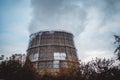 Big old cooling pipe with steam, smoke