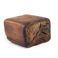 Big old dark cube is cut out from old wood. on white Royalty Free Stock Photo