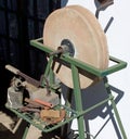 Big old grinding wheel on iron framework