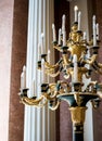 Big old torchere with candlesticks Royalty Free Stock Photo