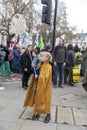 The Big One Demonstration. An eight-year-old girl with a painted Pacific on her cheek holds a poster - if