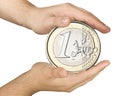 Big One Euro Coin Protecting Hands Care Isolated Royalty Free Stock Photo