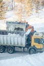 Cleaning and cleaning of roads in the city from snow in winter Royalty Free Stock Photo