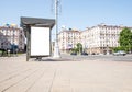 Big outdoor billboard mockup at bus stop. Brand, product, service, business advertisement poster placed along busy road Royalty Free Stock Photo