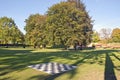 Big outdoor empty chess board in autumn park