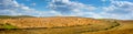 Great panorama of hay bales on the field after harvest Royalty Free Stock Photo