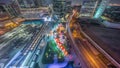 Dubai International Financial district aerial night timelapse. Panoramic view of business and financial office towers. Royalty Free Stock Photo