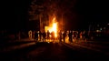 Big party at camp fire at night Royalty Free Stock Photo