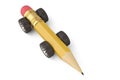 A big pencil and wheels on white background 3d illustration. Royalty Free Stock Photo